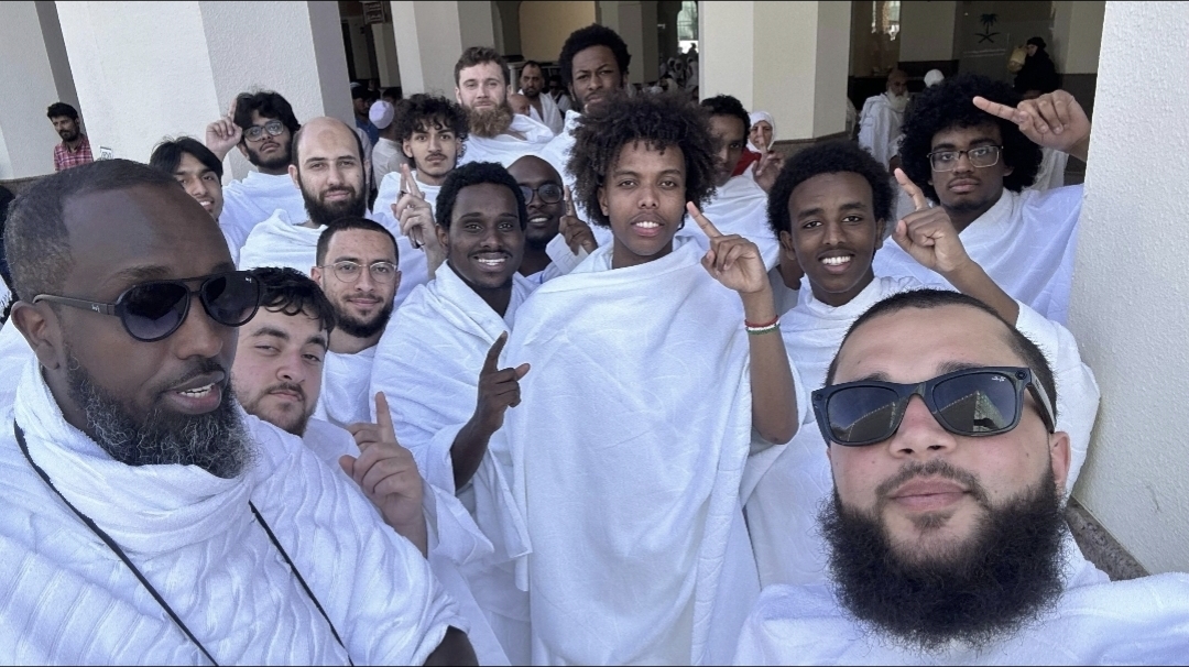 The group of brothers in ihram together at the Miqat before Umrah