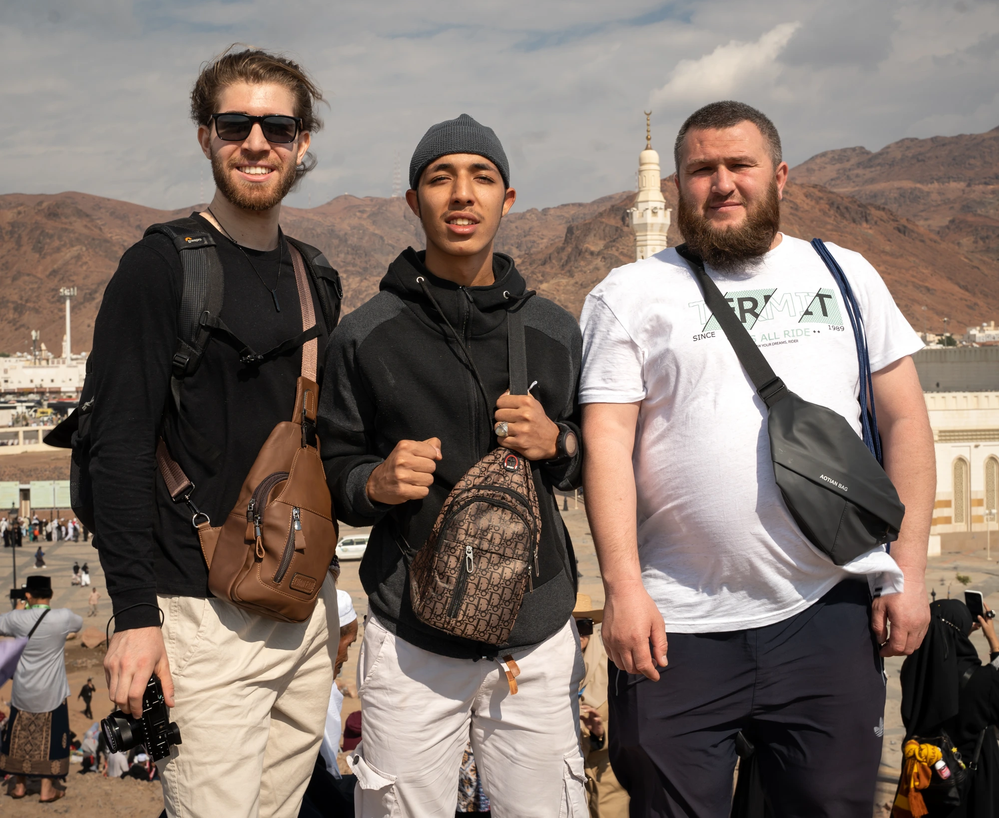 Three brothers together on Mount Uhud during a past Madinah tour